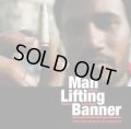 MAN LIFTING BANNER / The Revolution Continues (2Lp) Crucial responce 